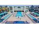 Aerial view of the community pool with a hot tub and several lounge areas at 8925 W Flamingo Rd # 228, Las Vegas, NV 89147
