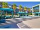 Inviting pool area with cabanas, lounges, and lush landscaping at 8925 W Flamingo Rd # 228, Las Vegas, NV 89147