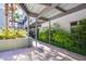 Beautiful walkway with steel beams, lush plants, and natural light at 8925 W Flamingo Rd # 228, Las Vegas, NV 89147