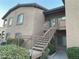 Exterior shot of a two-story condo building with well-maintained landscaping at 8985 S Durango Dr # 2043, Las Vegas, NV 89113