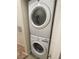 Convenient in-unit laundry featuring a stacked washer and dryer for efficient space-saving at 8985 S Durango Dr # 2043, Las Vegas, NV 89113