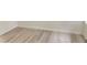 Bright room showcasing neutral walls, white trim, and wood-look flooring at 8985 S Durango Dr # 2043, Las Vegas, NV 89113