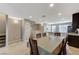 Open-concept living space seamlessly connects kitchen and staircase to dining area at 9050 W Tropicana Ave # 1080, Las Vegas, NV 89147