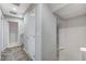 Hallway featuring carpet and a closet with white doors and baseboards at 9050 W Tropicana Ave # 1080, Las Vegas, NV 89147