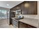 Well-appointed kitchen featuring stainless steel appliances and granite countertops at 9050 W Tropicana Ave # 1080, Las Vegas, NV 89147