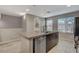 Modern kitchen features stainless steel dishwasher and granite countertops at 9050 W Tropicana Ave # 1080, Las Vegas, NV 89147