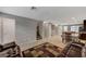 Expansive living space with access to the upper floor via staircase, dining and kitchen area at 9050 W Tropicana Ave # 1080, Las Vegas, NV 89147