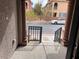 View from the front door of the property with a car parked on the street in front of the unit at 10067 Sand Key St, Las Vegas, NV 89178