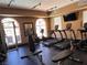 Well-equipped fitness center with modern exercise equipment and plenty of natural light at 10067 Sand Key St, Las Vegas, NV 89178