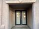 Covered patio area with double door access to the house at 10067 Sand Key St, Las Vegas, NV 89178