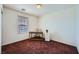 Bright bedroom features large window, plush carpeting, and wooden desk at 10808 Wallflower Ave, Las Vegas, NV 89135