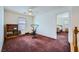 Spacious bonus room with workout equipment and a hardwood staircase at 10808 Wallflower Ave, Las Vegas, NV 89135