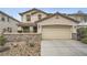 Charming two-story home featuring desert landscaping and a spacious two car garage at 10808 Wallflower Ave, Las Vegas, NV 89135