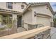 Charming front exterior features a two-car garage, stone accents, and manicured landscaping at 10808 Wallflower Ave, Las Vegas, NV 89135