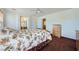 Bright bedroom featuring large windows, plush carpeting, and access to the bathroom at 10808 Wallflower Ave, Las Vegas, NV 89135