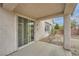 Covered patio features a sliding glass door with views of the spacious, low maintenance backyard at 10808 Wallflower Ave, Las Vegas, NV 89135