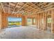 Unfinished living room with sliding glass doors framing a view of hills in the distance at 18 Placa De Rei Ct, Henderson, NV 89011