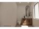 Clean powder room with marble countertop, modern sink, and minimalist design at 18 Placa De Rei Ct, Henderson, NV 89011