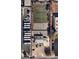 An aerial view showcases property and athletic field with basketball court, enclosed by a defined perimeter at 2130 E Maule Ave, Las Vegas, NV 89119