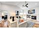 Inviting living room featuring a modern fireplace, ceiling fan, and stylish decor at 228 Mchenry St, Las Vegas, NV 89144