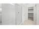 This bathroom features a glass shower with white tile, bright light, and a closet nearby at 74 Via Montoro, Henderson, NV 89011