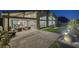 Expansive backyard featuring a large patio, artificial turf, and stylish outdoor furniture, ideal for entertaining at 10271 Meridian Hill Ave, Las Vegas, NV 89135