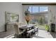 Sun-filled dining room with large windows providing natural light and views of the beautifully landscaped yard at 10271 Meridian Hill Ave, Las Vegas, NV 89135