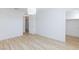 Cozy bedroom featuring wood-look flooring and a modern ceiling fan at 10631 Sariah Skye Ave, Las Vegas, NV 89166