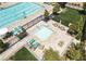 Luxurious pool and spa area with comfortable lounge seating and lush landscaping for relaxation at 10631 Sariah Skye Ave, Las Vegas, NV 89166