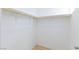 Ample walk-in closet with a rod for hanging clothes and wood flooring at 10631 Sariah Skye Ave, Las Vegas, NV 89166