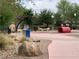 Dog park features agility equipment and play areas, providing a fun and safe environment for dogs at 1072 Pennyfeather Rd, Henderson, NV 89015