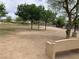 Dog park with walking trails, open grassy areas, and mature trees, a beautiful and spacious dog park at 1072 Pennyfeather Rd, Henderson, NV 89015