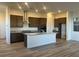 Spacious kitchen with stainless steel appliances, granite countertops, and a large island at 12434 Parkscene Pl, Las Vegas, NV 89138