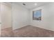Well-lit bedroom with carpet and a window offering natural light and neighborhood views at 12457 Sunset Sage Ave, Las Vegas, NV 89138