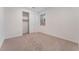 Carpeted bedroom with a window and closet at 12457 Sunset Sage Ave, Las Vegas, NV 89138