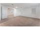 Spacious carpeted bedroom featuring multiple windows for natural light at 12457 Sunset Sage Ave, Las Vegas, NV 89138