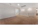 Upstairs loft featuring neutral walls, a fan and access to the adjacent rooms at 12457 Sunset Sage Ave, Las Vegas, NV 89138