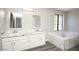 Bathroom with double vanity and a large soaking tub at 1967 N Moapa Valley Blvd, Logandale, NV 89021