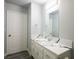 Modern bathroom features quartz countertop, sleek fixtures, vanity and large mirror at 1967 N Moapa Valley Blvd, Logandale, NV 89021