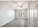 Bright bedroom with ceiling fan, closet, and large window offering a view of the outdoors at 1967 N Moapa Valley Blvd, Logandale, NV 89021
