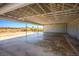 A large, open garage space with a high, white ceiling, perfect for multiple vehicles or storage at 1967 N Moapa Valley Blvd, Logandale, NV 89021