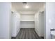Large walk-in closet with built-in shelving and cabinets at 1967 N Moapa Valley Blvd, Logandale, NV 89021