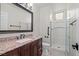 Bathroom featuring granite counters, a shower, and a toilet at 1988 Villa De Sol St, Las Vegas, NV 89156