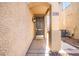 Exterior featuring the address displayed above the front door with a covered entryway at 1988 Villa De Sol St, Las Vegas, NV 89156