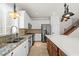 Modern kitchen featuring white cabinets, stainless appliances, and granite counters at 1988 Villa De Sol St, Las Vegas, NV 89156