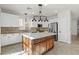 Gorgeous kitchen featuring island, pendant lighting, and stainless steel appliances at 1988 Villa De Sol St, Las Vegas, NV 89156