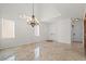 Open concept living area featuring marble floors and large bright windows at 1988 Villa De Sol St, Las Vegas, NV 89156