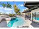 Backyard pool with a jacuzzi and covered patio at 2211 Arborwood Way, Las Vegas, NV 89142