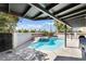 Backyard pool with a jacuzzi and covered patio at 2211 Arborwood Way, Las Vegas, NV 89142