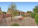 Expansive backyard showcasing a well-kept landscape and privacy wall at 2324 Willow Wren Dr, North Las Vegas, NV 89084